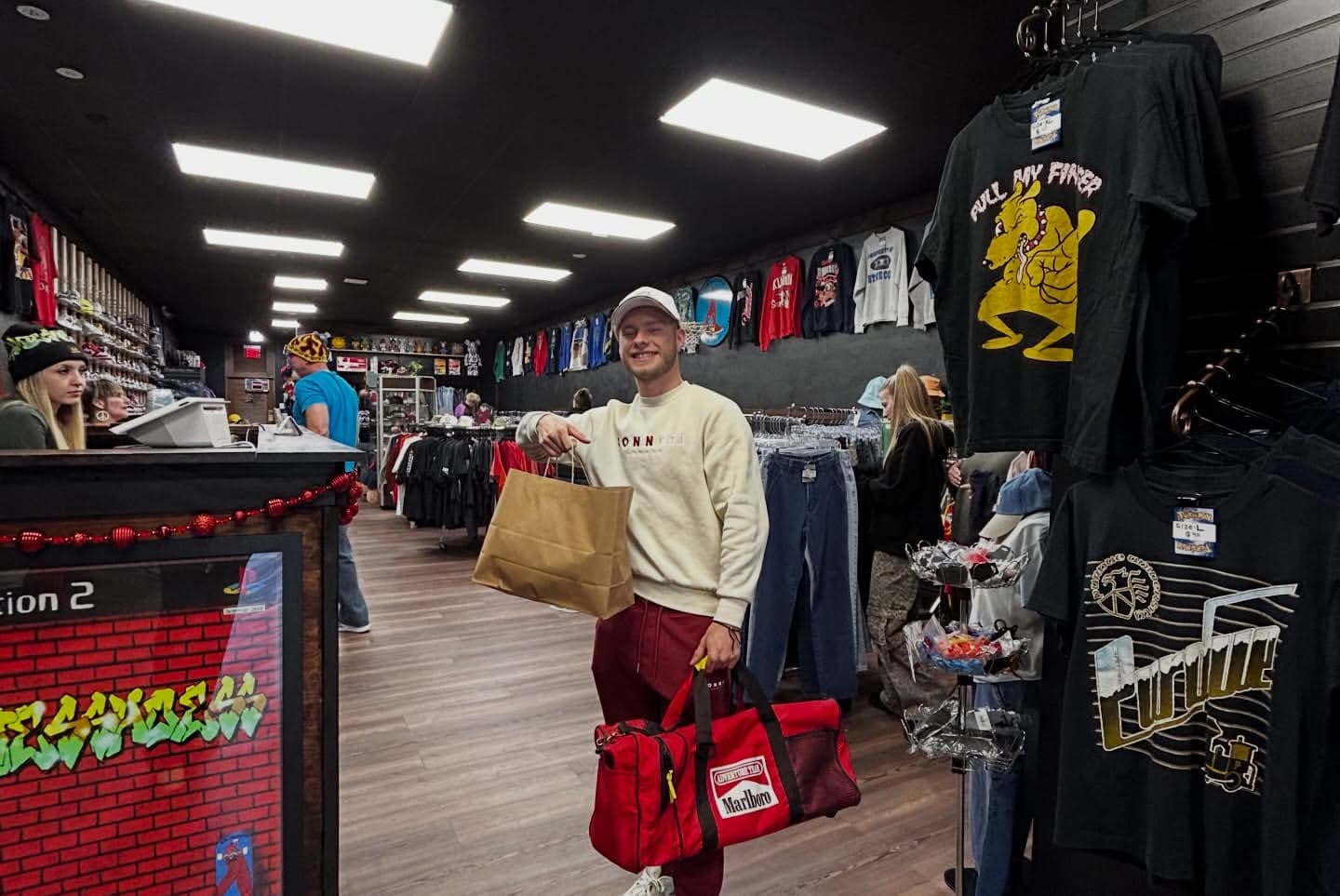 Customer pointing at bag